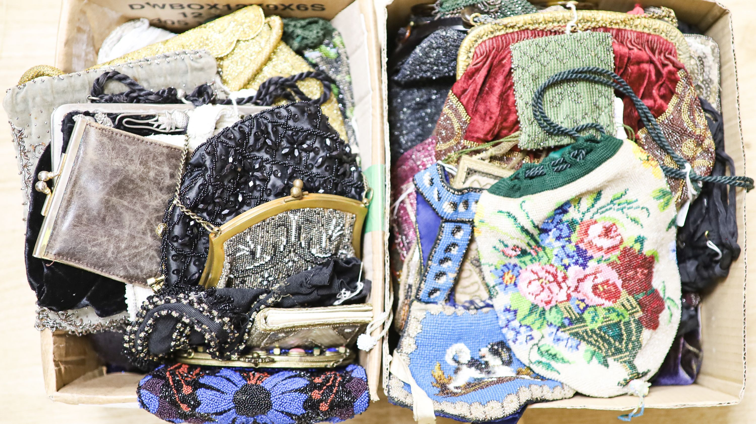 A collection of approximately fifty Victorian and later beadwork, white metal and fabric purses etc.